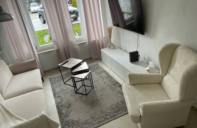 Vacation apartment (63 m²) for up to 4 people. Living room with sofa bed, kitchenette, separate bedroom, terrace