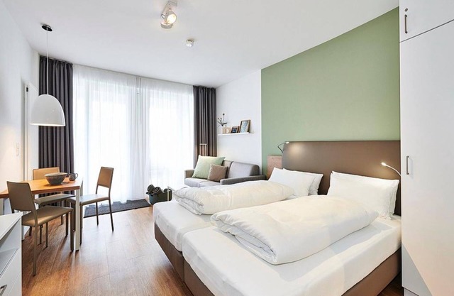 Vacation apartment near the beach with terrace incl. free use of swimming pool & sauna