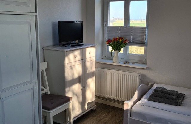 Vacation home Hemenswarft directly on the North Sea with sea view - Apartment Langeness