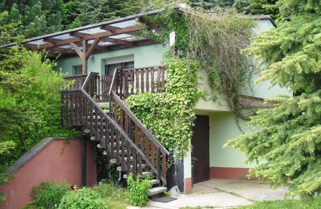 Vacation home in a superb location with a view of the forest and lake