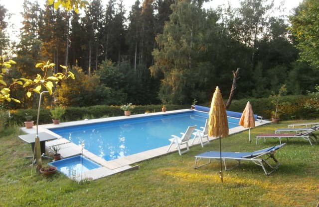 Vacation home in beautiful nature with large garden. Outdoor pool, for families, with pets