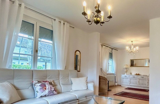 Vacation home Köchlin - charming semi-detached house with garden and parking space