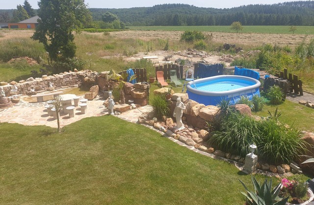 Vacation home "Palmenland " with sauna, whirlpool, small waterfall and water place
