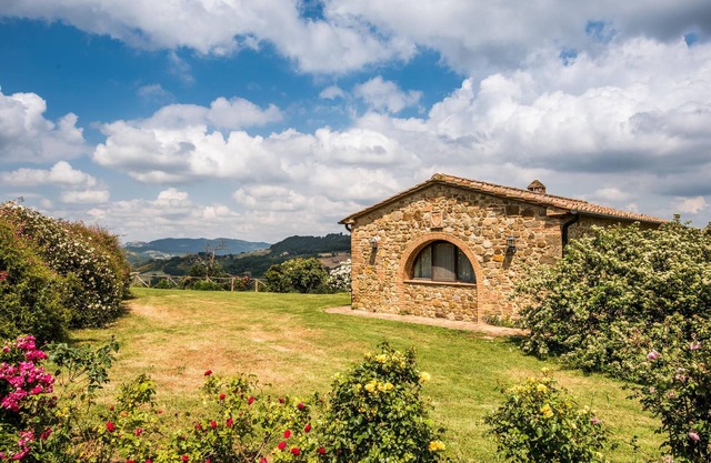 Vacation home with pool and panoramic views of the countryside.