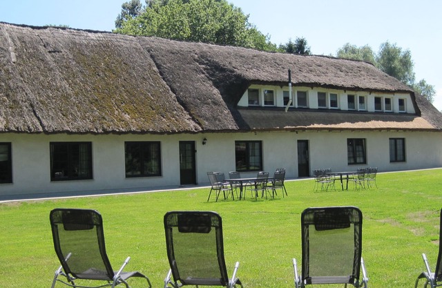 Vacation under the thatched roof opposite the island of Usedom