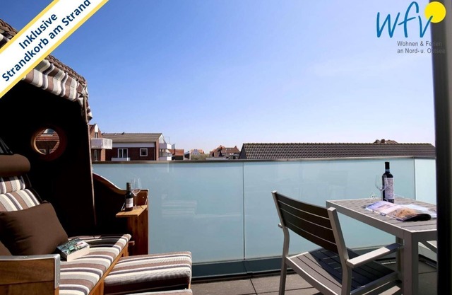 Vacation with a sunny balcony and your own beach chair on the beach