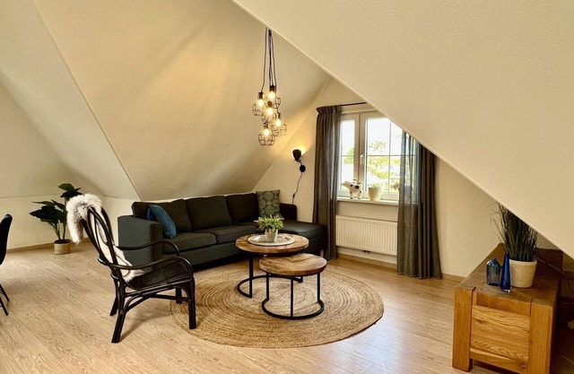 Very spacious and tastefully furnished 3-person apartment near the forest, beach and sea with free WIFI, in a quiet, green and small-scale holiday park.
