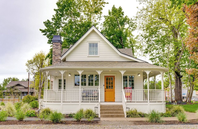 Victorian farmhouse with wraparound porch