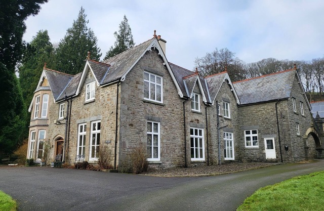 Victorian stone mansion in extensive grounds overlooking Bala Lake