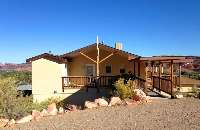 Views of the La Sal Mountains, Red Rock Cliffs, and a Private wrap around Deck!