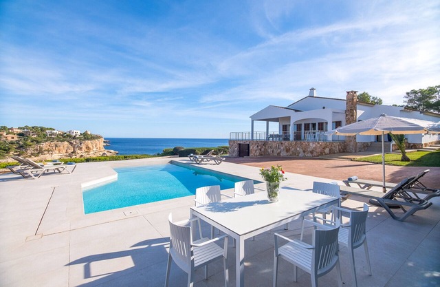 Villa Can Ferrando holiday house in Cala Santanyi first line seaview with Mediterranean luxury