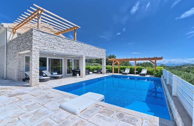 Villa Caprice - with a heated pool and a spa, for 10 guests on Island Hvar