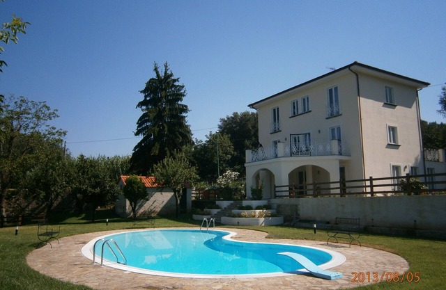 Villa Don Agostino with swimming pool surrounded by greenery