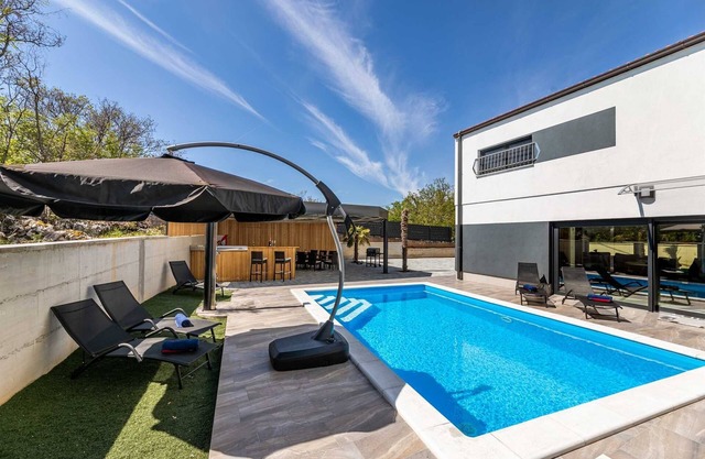 Villa George with a heated swimming pool