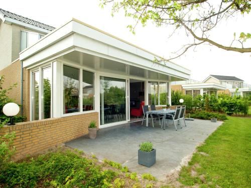 Villa in Maaspark with Sauna and Lake Views