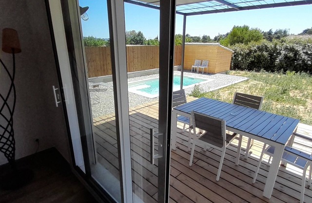 Villa la Câlebelle with swimming pool and wooden terrace near the Ardèche.