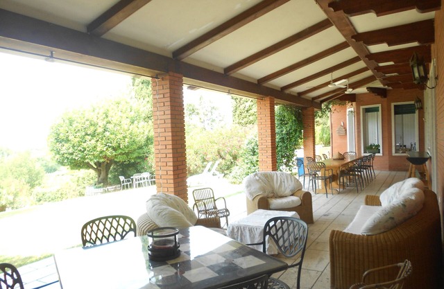 Villa lake Garda/Lazise with large porch overlooking the lake surrounded by greenery