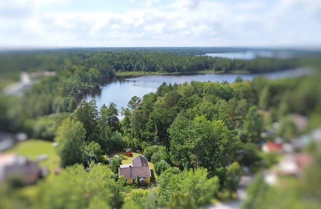 Villa Lotte - Holiday home in southern Sweden with sauna, boat & nature near the lake