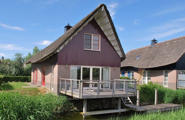 Villa on the water with sauna in Friesland