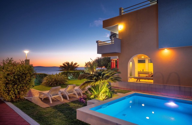 Villa Palmina,villa with pool on the beach.