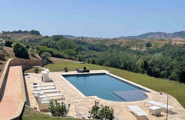 Villa Santo Pietro with panoramic private pool close to San Gimignano and GOLF