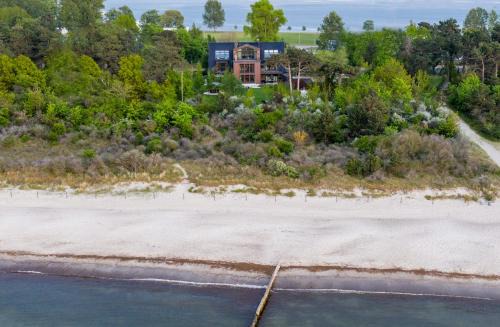 Villa Schmidt - Strandhaus direkt am Meer mit Sauna, Sport und Dünengarten I