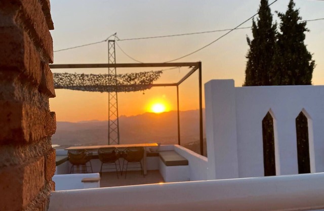 Villa with lots of privacy, sitting areas and great views all around with large pool.