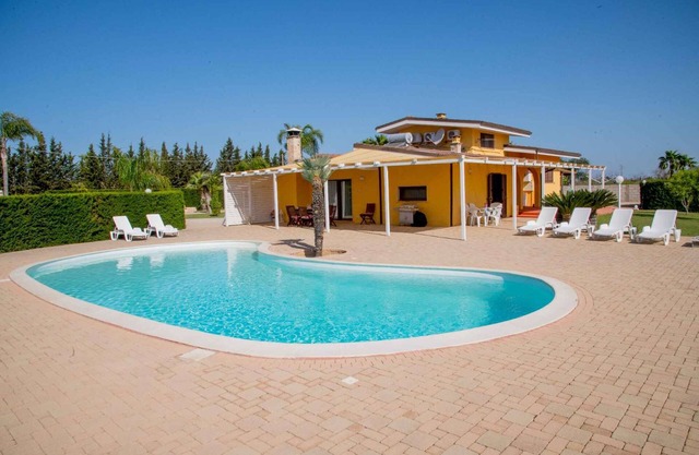 Villa with an outdoor pool and Internet