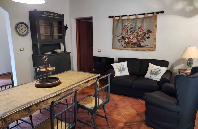 Villa with swimming pool in a flower and fruit garden