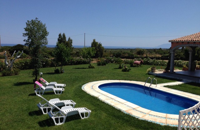 Villa with private pool, large lawn, all with sea view.