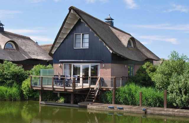 Villa with terrace on the water in Friesland