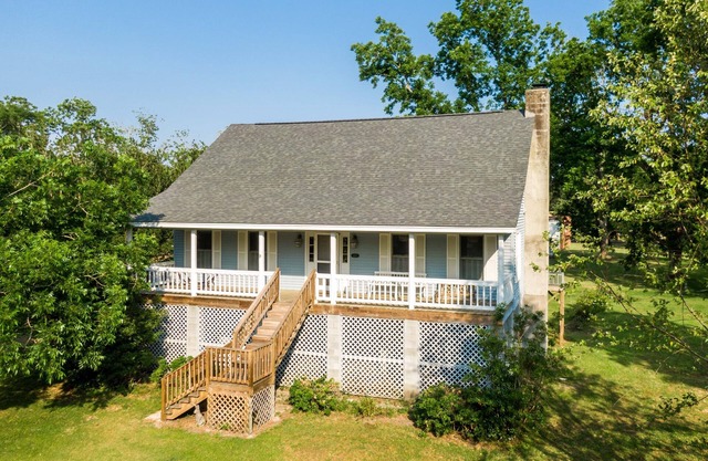 Village Home located in the Village this home exudes Old Oriental charm