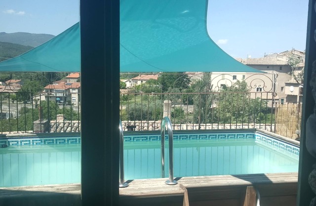 Village house with swimming pool and very large terrace, 10 mn south of Sisteron.