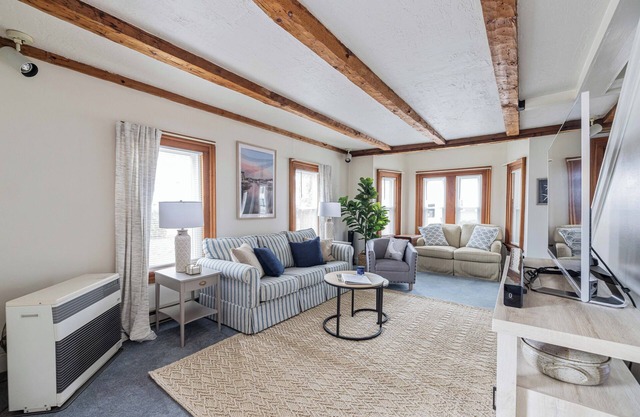 Walk to Shops & Beach. Cozy home with modern amenities for a memorable stay