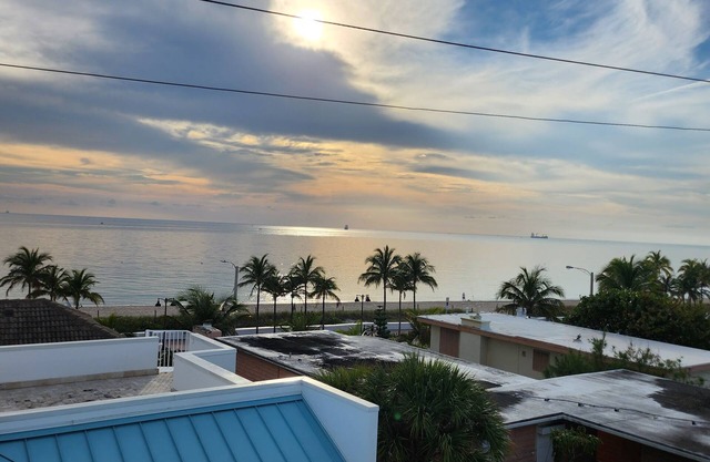 Walk to the Beach! 5-bdrm home w/wrap-around deck views for the entire family.