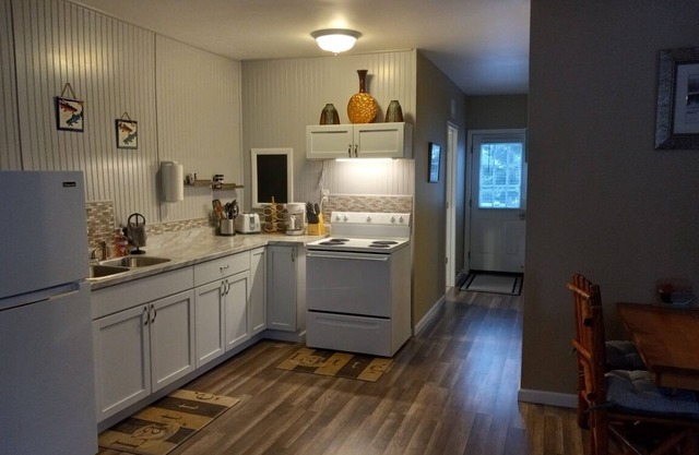 Walking distance to lake & township park with sandy beach!