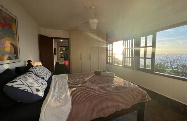 Wall to wall windows with views across the ocean, just 5 minute walk to the beach in a safe location
