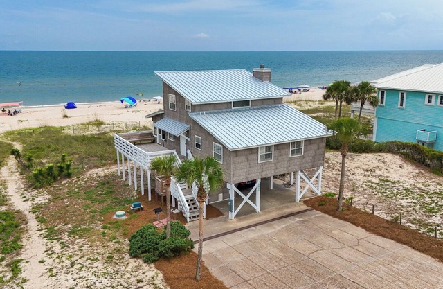 Wander from the cool shade of the screened porch to the sun deck with your favorite book!