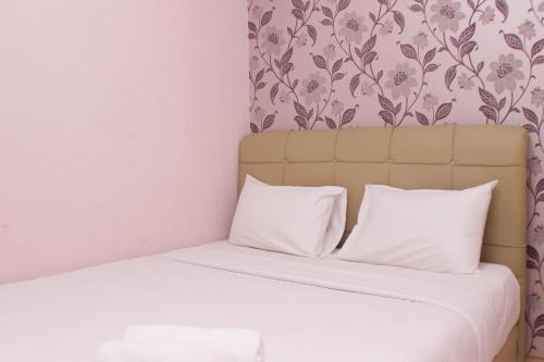 Warm and Homey 2BR at Springlake Summarecon Bekasi Apartment By Travelio