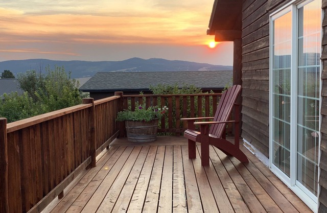 Warm and inviting home with a hot tub! Close to downtown, riding/walking trails!