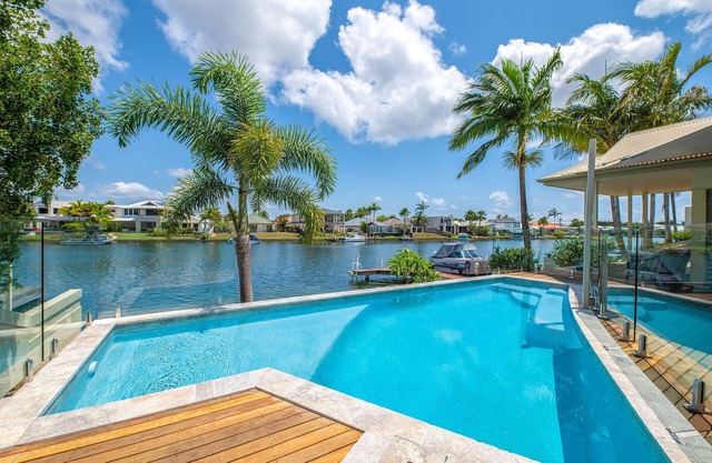 Water Front Luxury home with sparkling Pool in beautiful Noosa Waters.