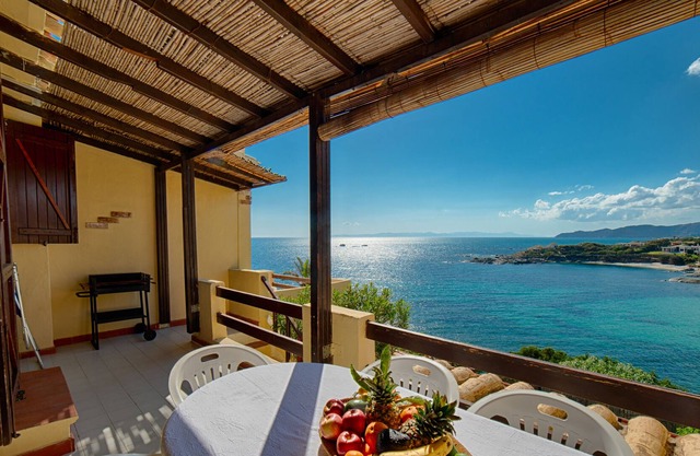 Water front Villetta with terrace and an amazing view over beach, bay, sunset