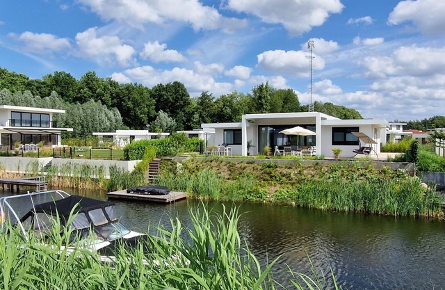 Water villa with jetty and 3 leisure boats