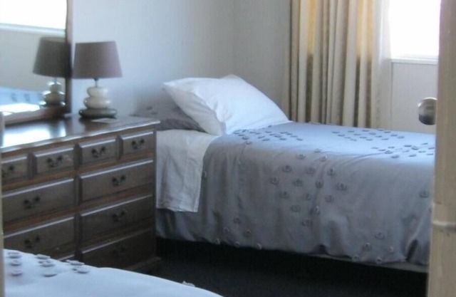 Waterfront 3 -bedroom bungalow opposite the South Bay Marina and public slipway