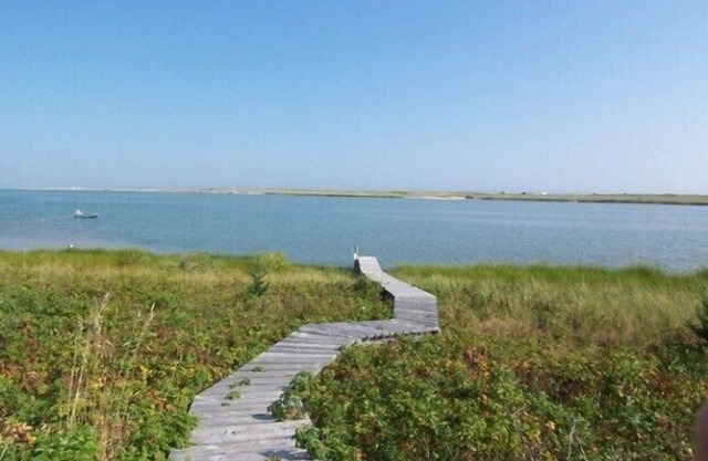 Waterfront 4 bedroom, 3 bath home. Spectacular 180 degree view of Katama Bay
