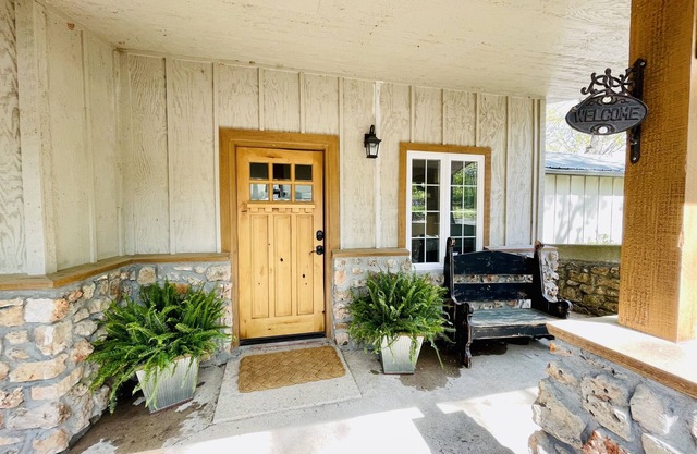 Waterfront beauty with dock and fireplace! Check in Bay! New Hot Tub!