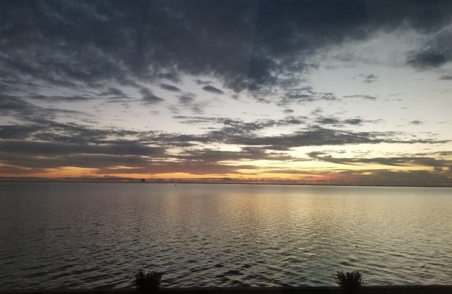 Waterfront condo with direct views of NASA close to beach, unique Florida Oasis