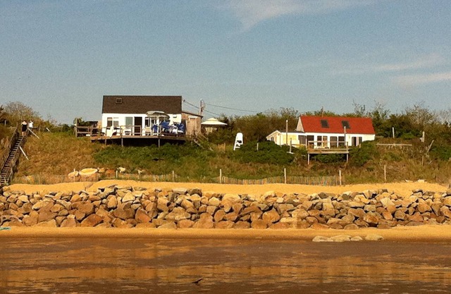 Waterfront Cottages with Spectacular Sunset with wall of windows and AC