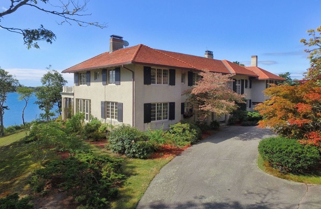 Waterfront estate with private beach and dock