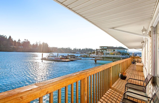 Waterfront home on Puget Sound lagoon with canoe & rowboat
